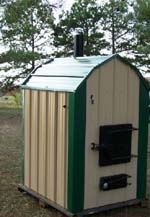 Green and Tan Outdoor Wood Boiler